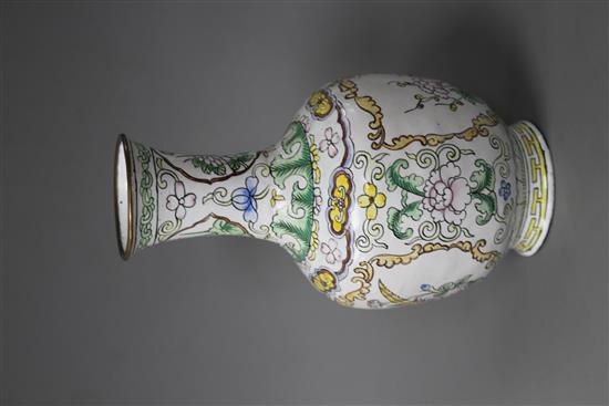 A Chinese enamelled brass vase, decorated with flowers, height 15.5cm